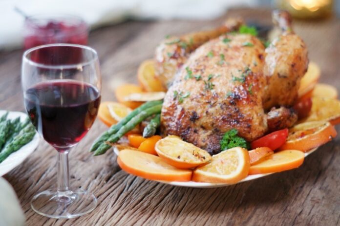 thanksgiving-dinner-table-served-with-red-wine-2022-08-01-02-04-44-utc