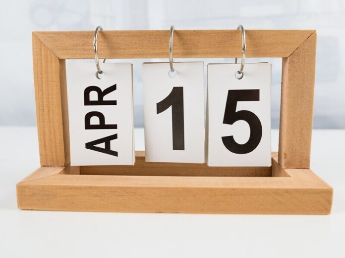 April 15, wooden calendar on a white table. Immediate steps to take if you've missed or are about to miss the tax deadline
