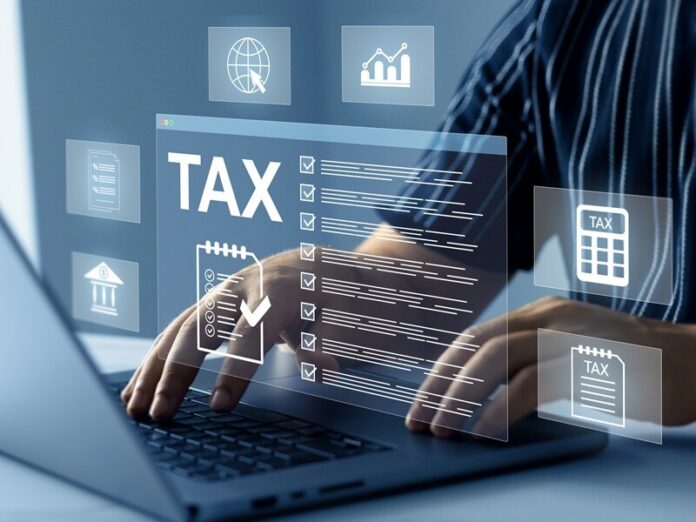 Tax calculation and financial accounting concept. Online taxes, VAT, income, budget planning and digital finance management. Use Q3 Financials to Build a Smarter Year-End Budget